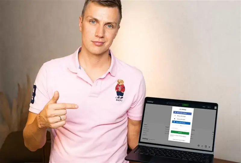 a man standing infront of laptop showing how can Global Remote Workers Join Talent Marketplace: